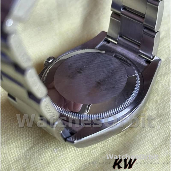 Unisexs Rolex Oyster Perpetual Air-King 34mm Unisex-114234-Blue Dial-Fluted White Gold Bezel Blue Replica Image