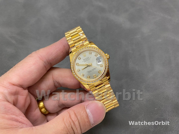 Replica Rolex Datejust 31 Gelbgold Silber Diamant Zifferblatt Diamant Lünette M278288RBR 0028 Damenuhr Exklusives Design