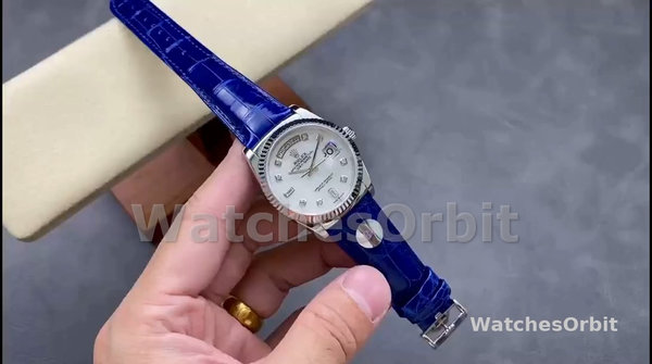 Replica Rolex Day Date 36-m128396TBR 0019 voor heren, diamanten ring, ijsblauwe Romeinse wijzerplaat