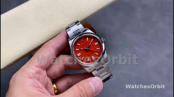 Replica Rolex Oyster Perpetual-126000 0007, Oystersteel, Koraal Rode Wijzerplaat, Oysterband Rood