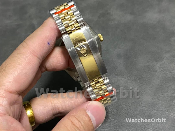 Womens Rolex Day Date 36-m128396TBR 0016, Platinum, Turquoise, Diamond‑Set Roman Dial, Diamond Bezel, Blue Replica Watch Image
