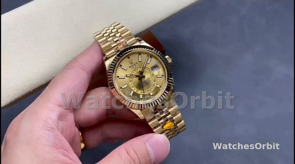 Replica Rolex Sky-Dweller 42mm Uomo-m336938-0004-Dal quadrante oro giallo-champagne Champagne