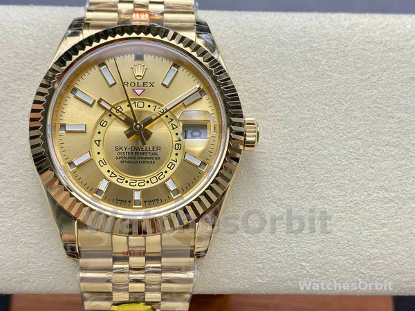 Replica Rolex Sky-Dweller 42mm Uomo-m336938-0004-Dal quadrante oro giallo-champagne Champagne