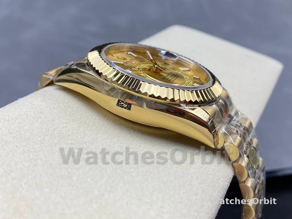 Replica Rolex Sky-Dweller 42mm Uomo-m336938-0004-Dal quadrante oro giallo-champagne Champagne